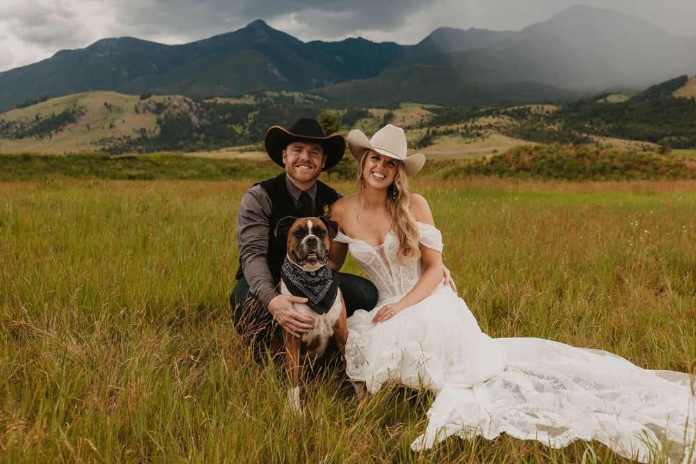 Bride and Groom pose with their dog at Copper Rose Ranch in Paradise Valley under the Mountains near Pray, Montana by local Phtoographer