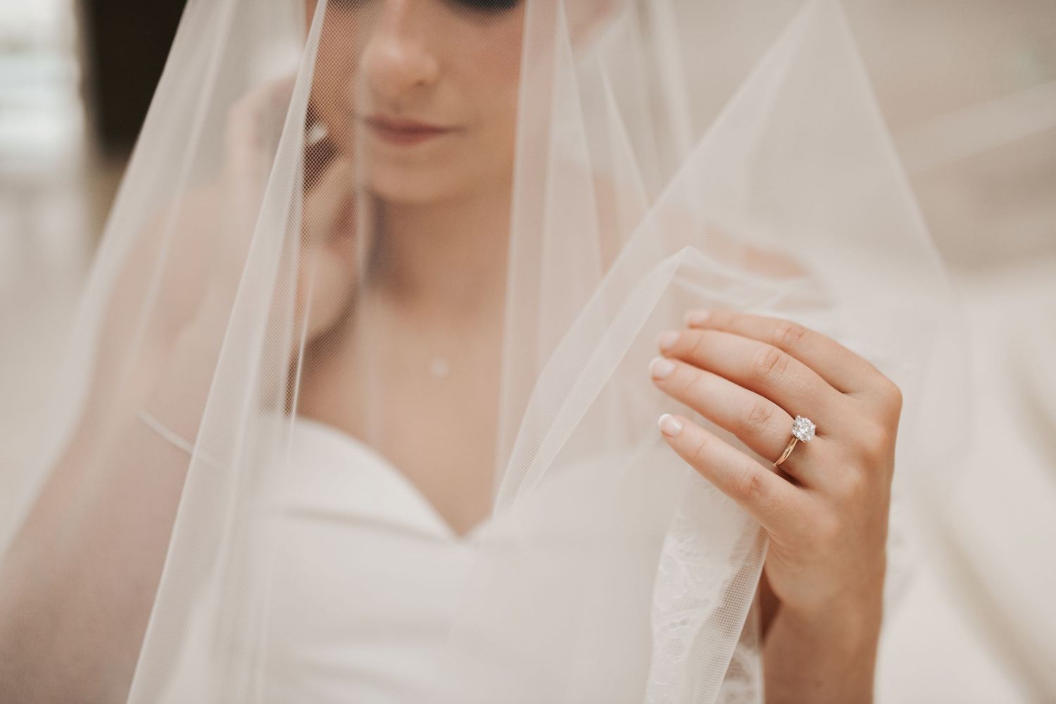 High-end Dallas bridal portrait with dramatic architecture and timeless wedding style