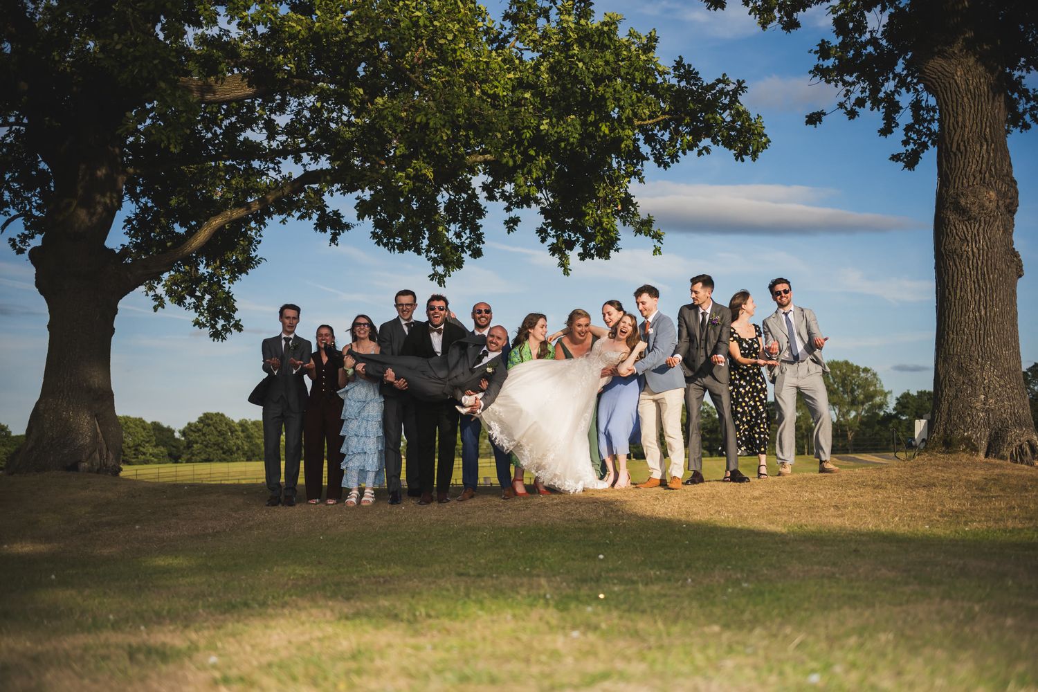 Wedding guests in the gardens at Merrydale Manor, Over Peover