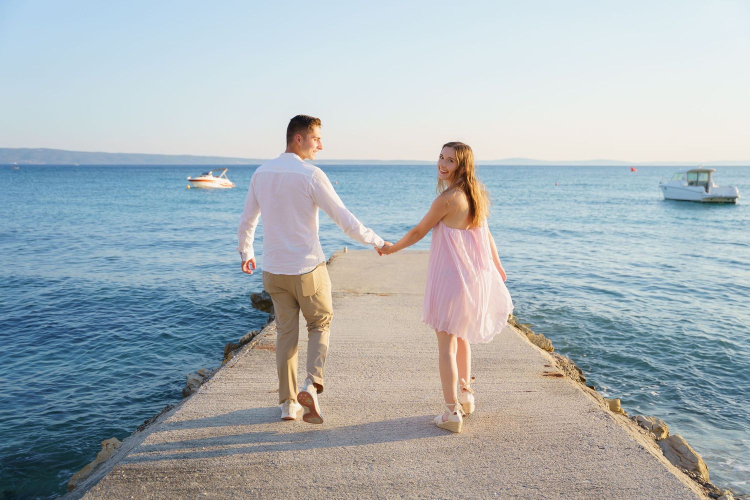 Surprise Proposal at pier at Podstrana Beach