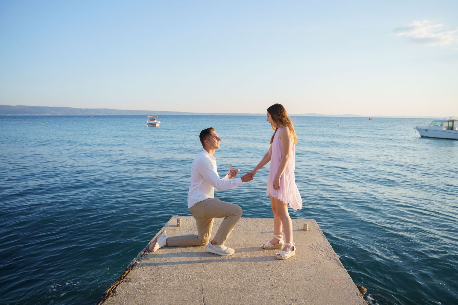 Surprise Proposal at pier at Podstrana Beach SPLIT