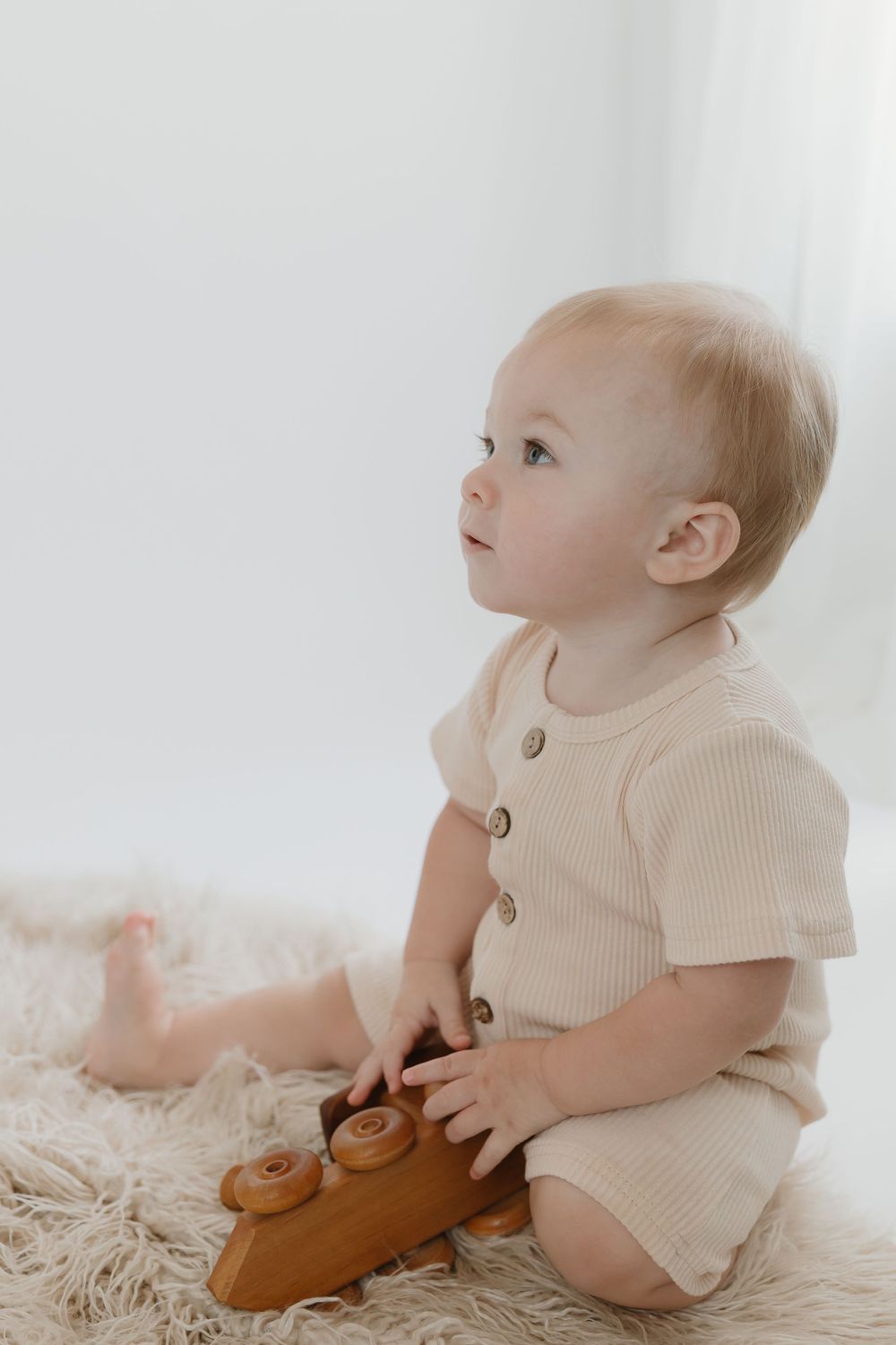 Simple set ups for One year sessions allow your child's personality and details to be captured beautifully