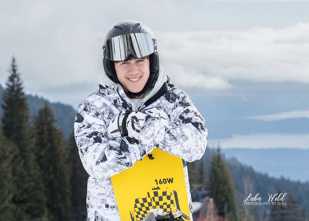 winter outdoor senior session snowboarding and skiing at Schweitzer Mountain by Post Falls photographer Luba Wold