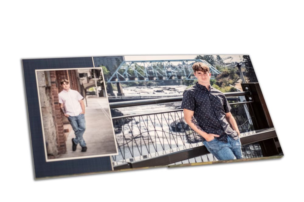 page from a Senior photo book featuring young man boy in Spokane riverfront park by Luba Wold photographer