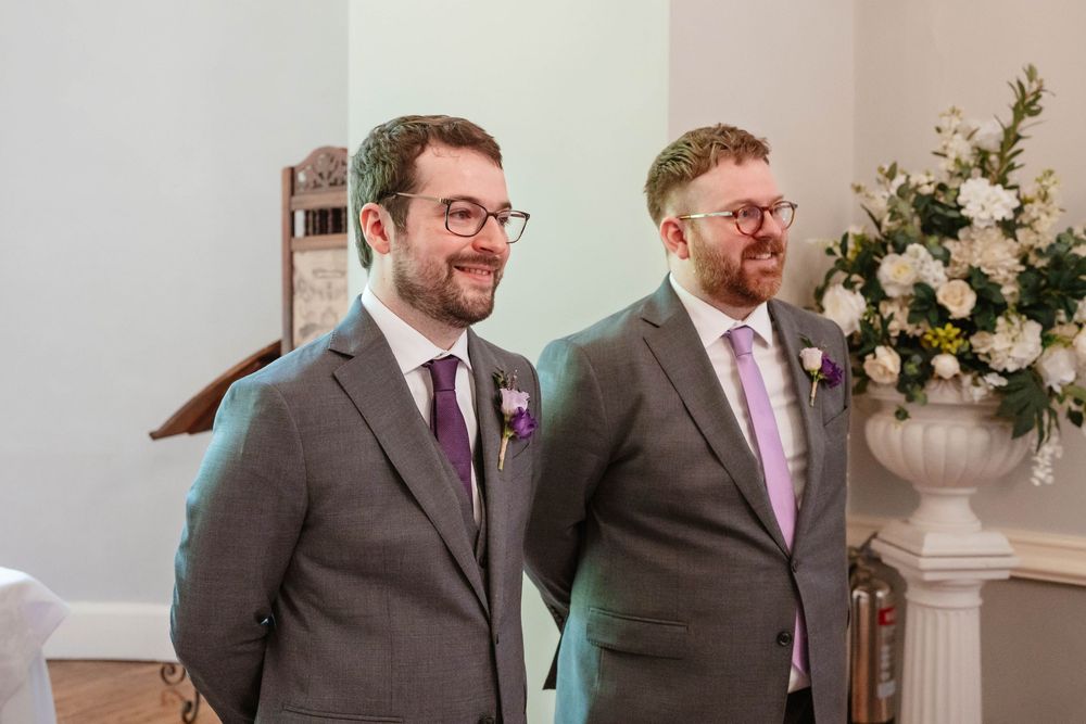Clearwell Castle wedding venue Gloucestershire castle groom and best man at the alter