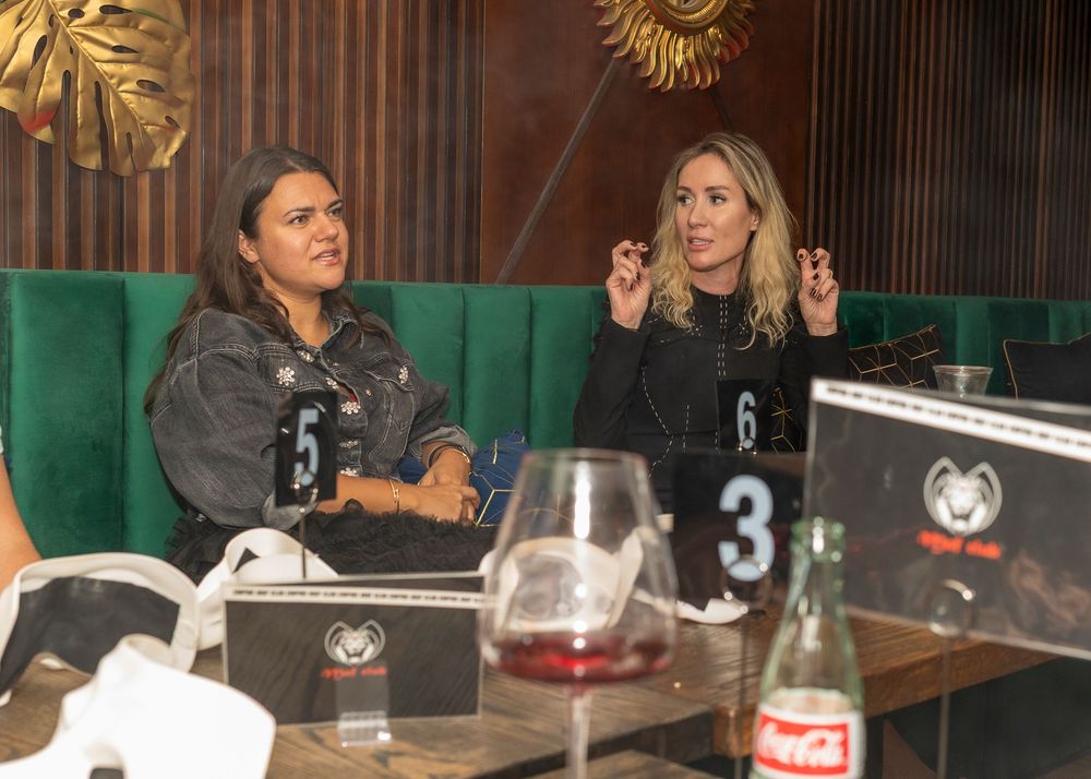 game events couple of woman during the strategic game mafia