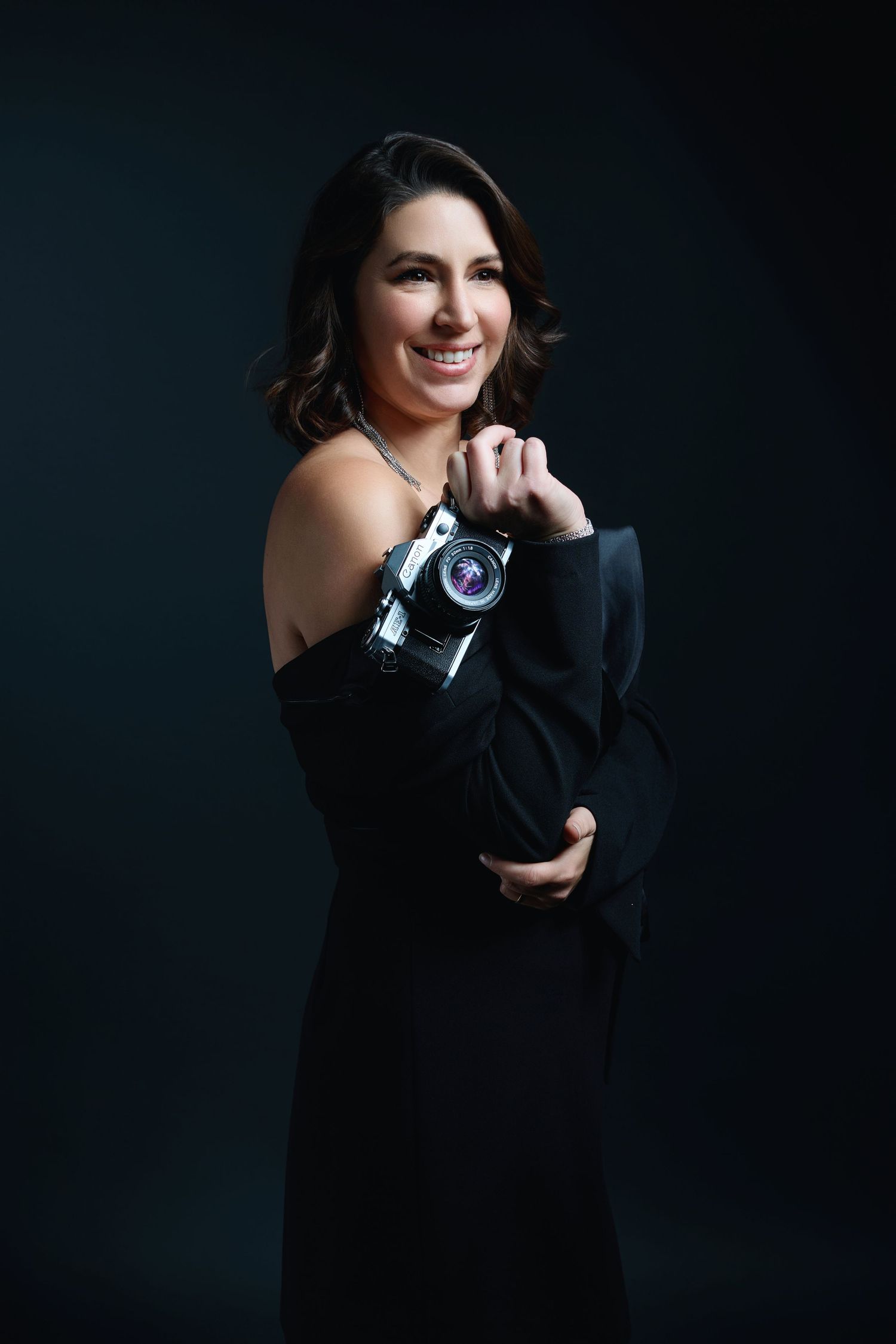 The studio offers a high-end, full-service portrait experience designed to guide clients through every step of the process.
