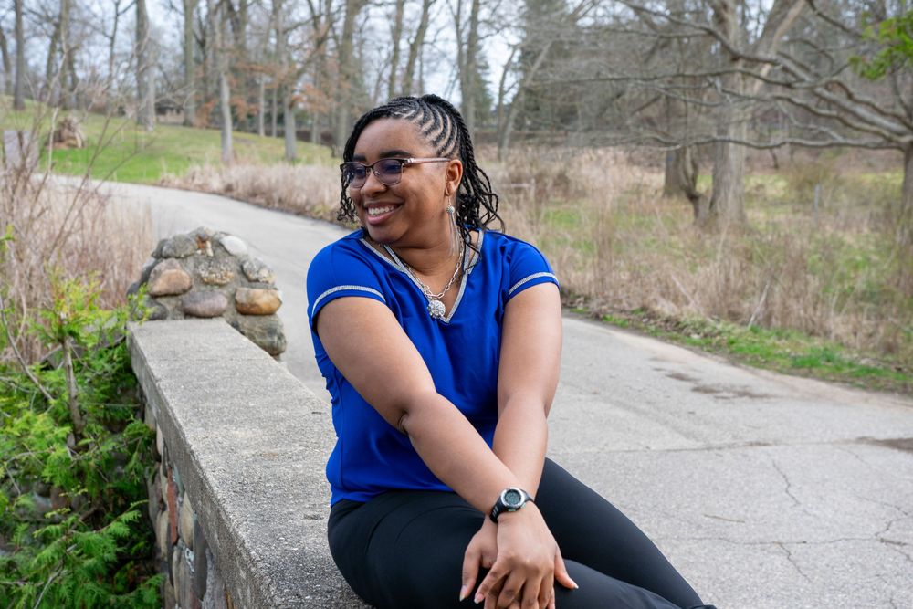 Natural outdoor portraits along a walking path surrounded by spring foliage.