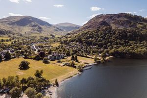 Seven panoramic images of Scottish highlands and lochs showing mountains, lakes, and countryside vistas.