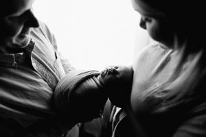 Artistic black and white sequence capturing intimate silhouettes against bright backlighting.
