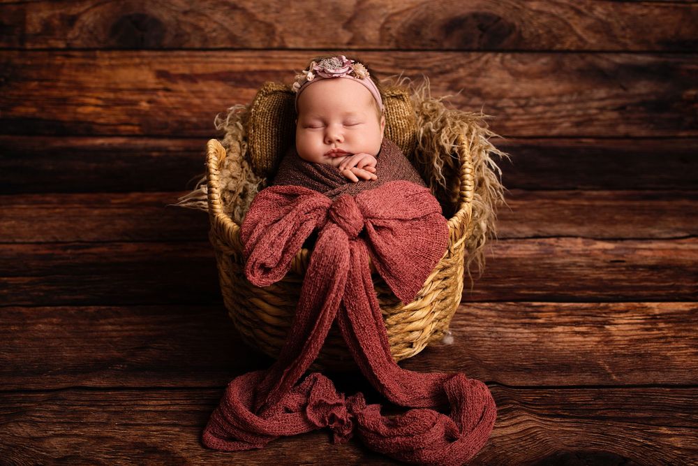 A rustic wooden wall background with dark brown planks showing natural wood grain texture and knots.