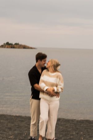 Couple Engagement session captured in Duluth Minnesota with Lake Superior in the background