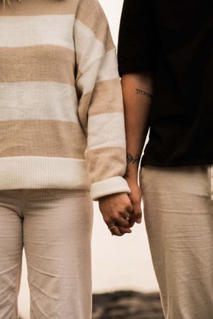 Couple Engagement session captured in Duluth Minnesota with Lake Superior in the background
