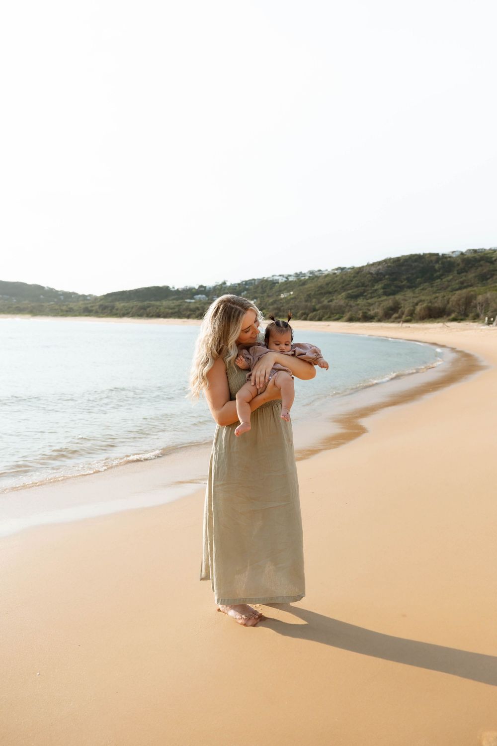 central coast family photographer capturing real, candid moments between mums and their babies.