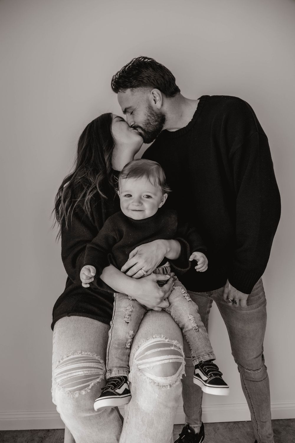Black and white central coast maternity and family photography capturing natural, emotive motherhood moments in soft light.