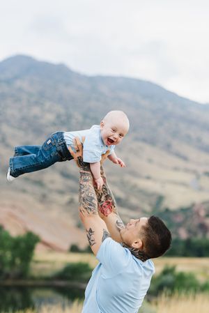 father and son photos in Morrison Colorado with red rocks in the background