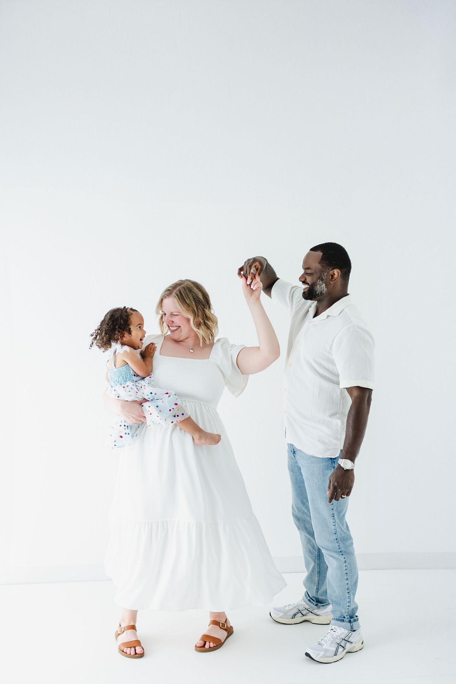 In studio family photo shoot near me. Colorado family photographer in studio. Studio family photo shoot with toddler. Colorado photographer