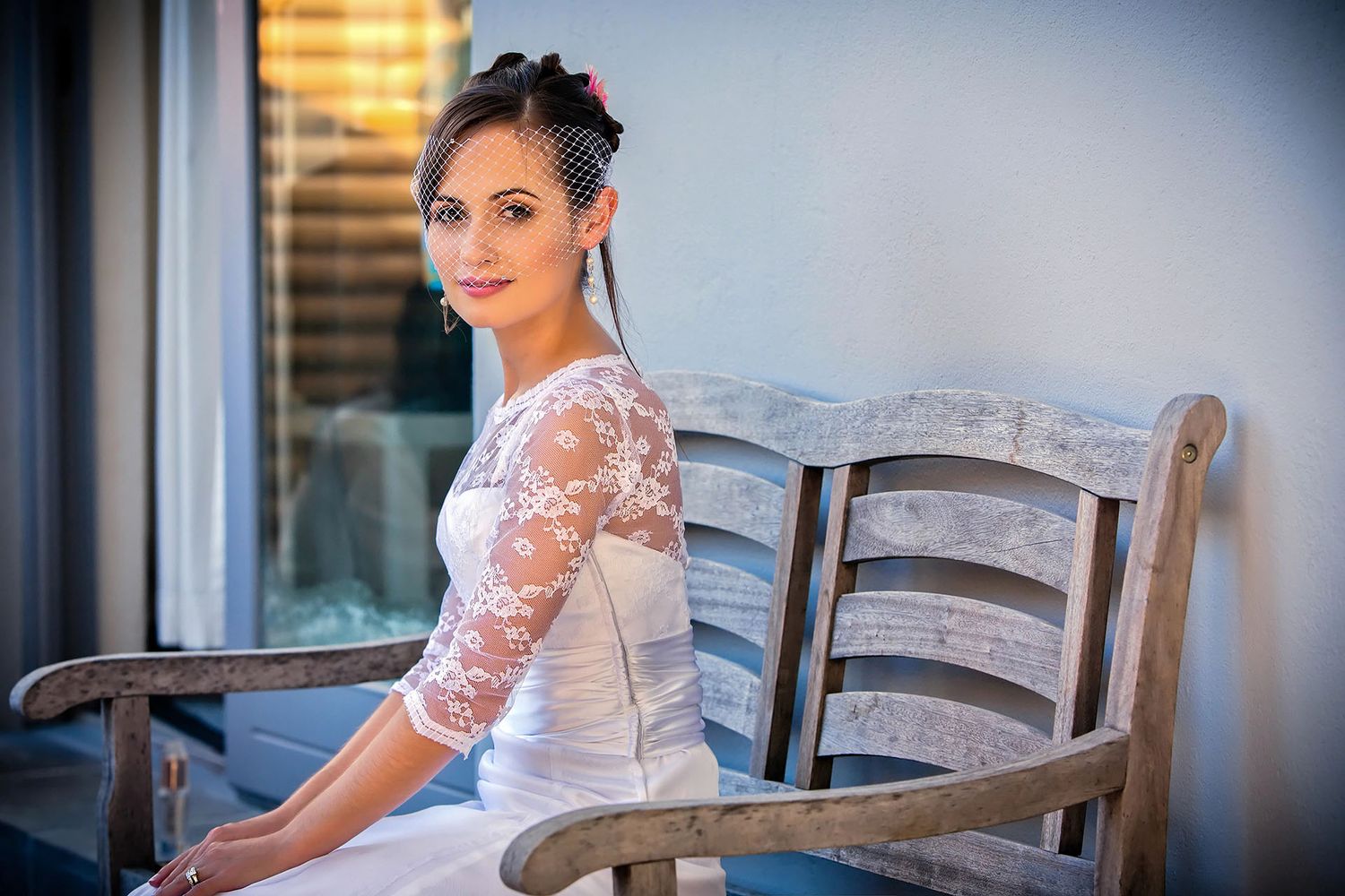 Melbourne wedding photographer captures a bride in a beautiful wedding dress, enjoying a quiet moment.
