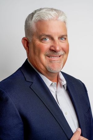 Corporate headshot of business professional in Dallas, Texas photographed by MB Video Productions