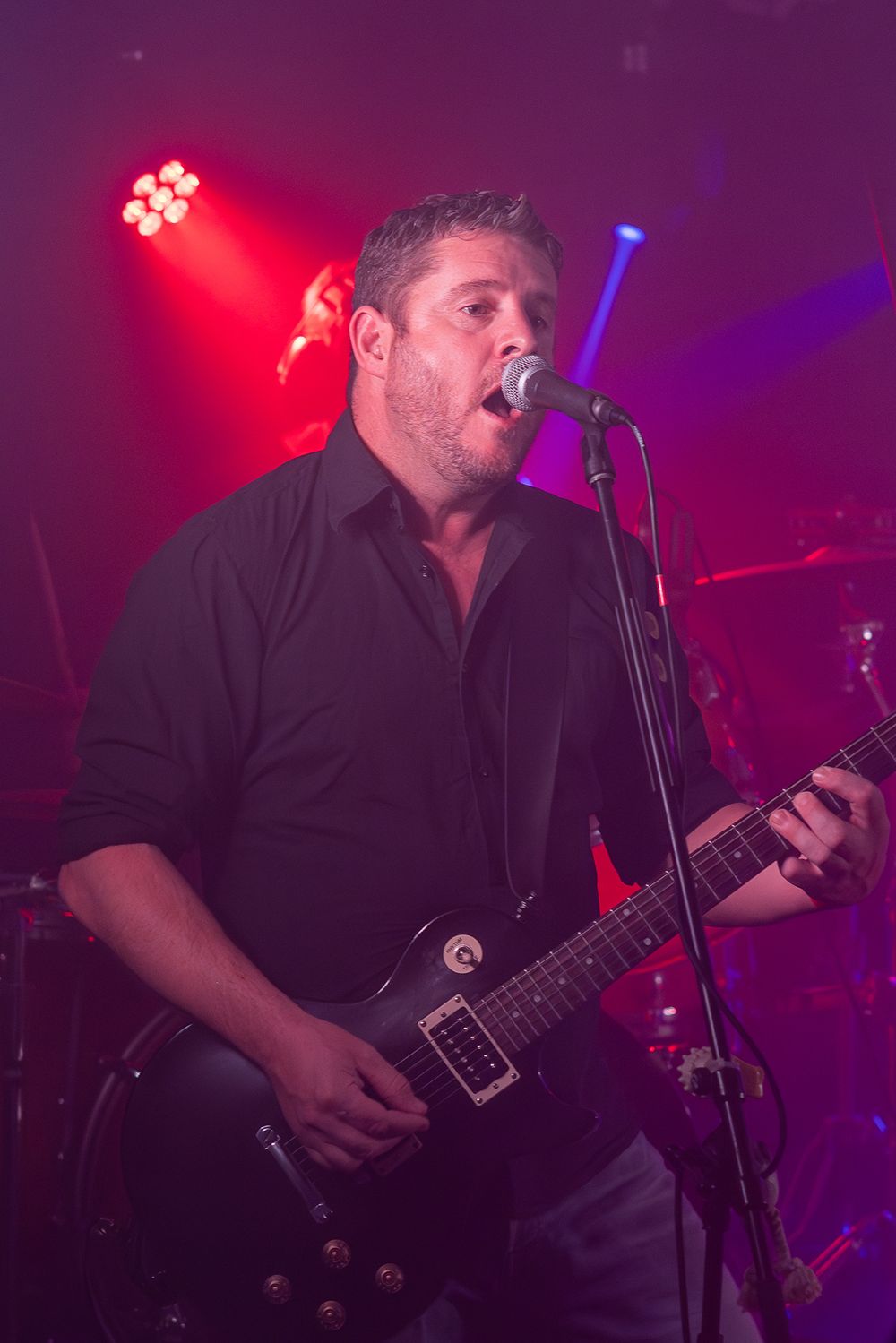 Gitarrenspieler auf der Bühne - Eventfotograf Robert Grunder