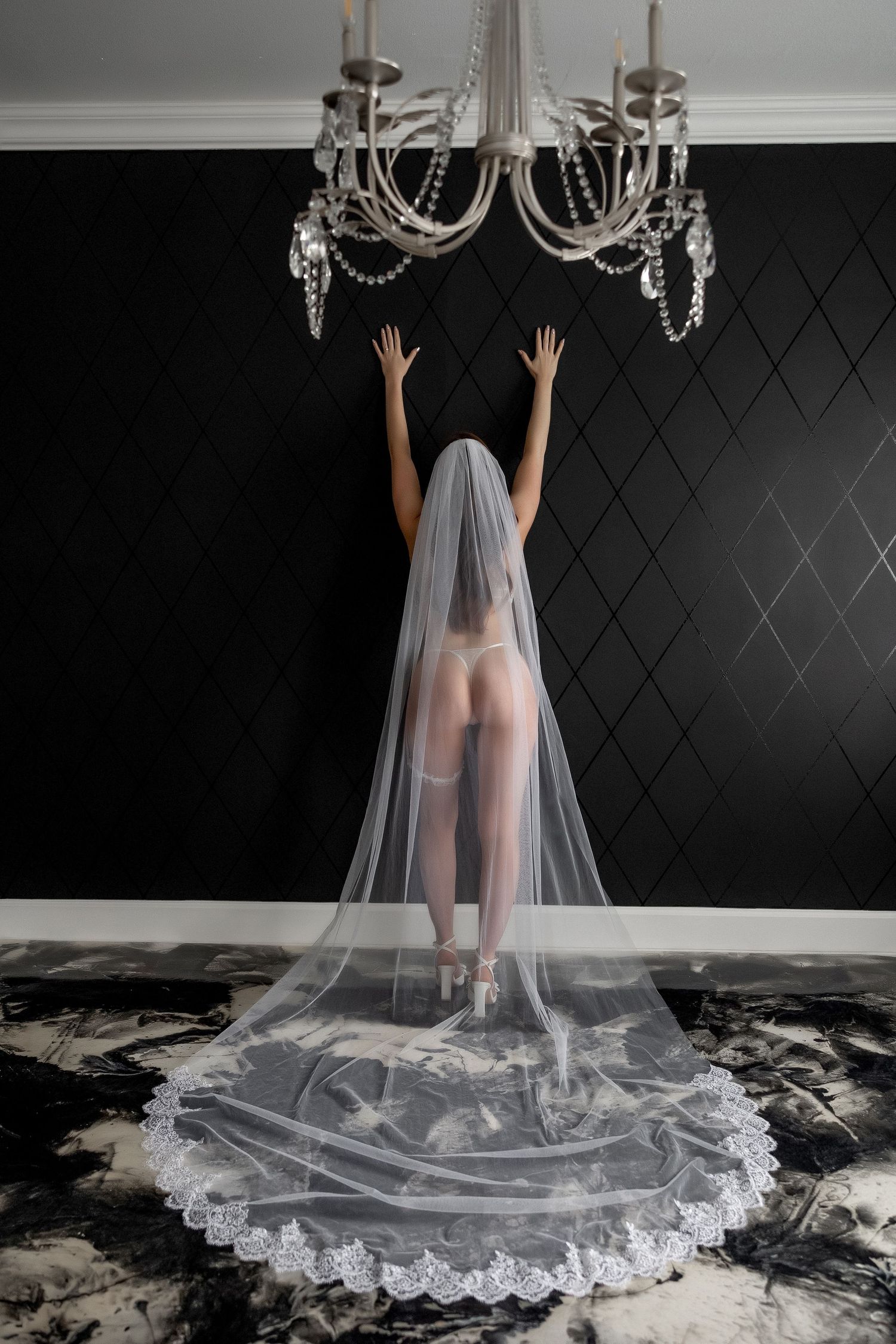 denver photographer doing bridal boudoir for wedding gift with veil
