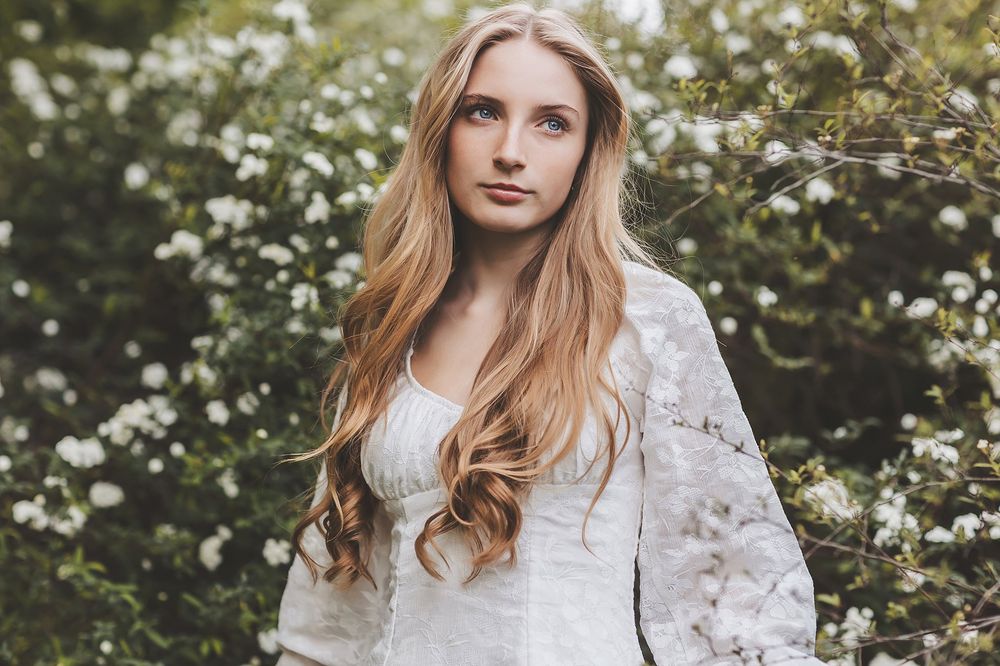 Garden portrait series with white flowering trees in soft natural light.