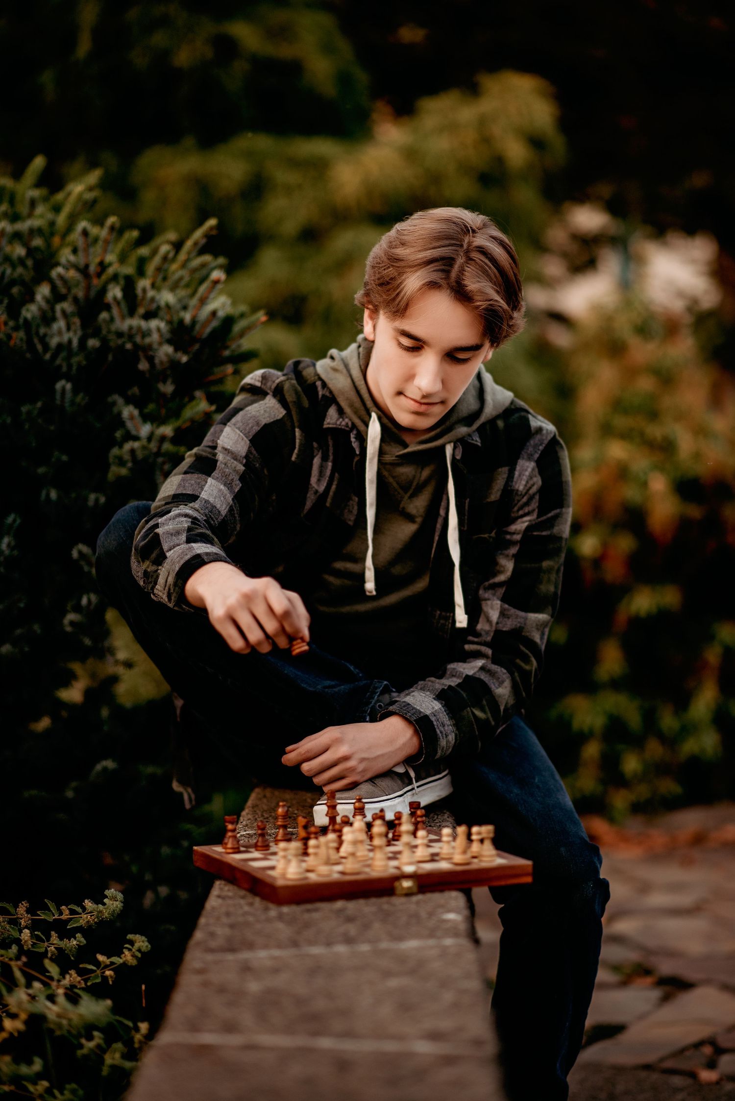 Senior playing chess