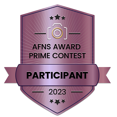 AFNS Award Prime Contest Participant 2023 badge with camera icon and star decorations.