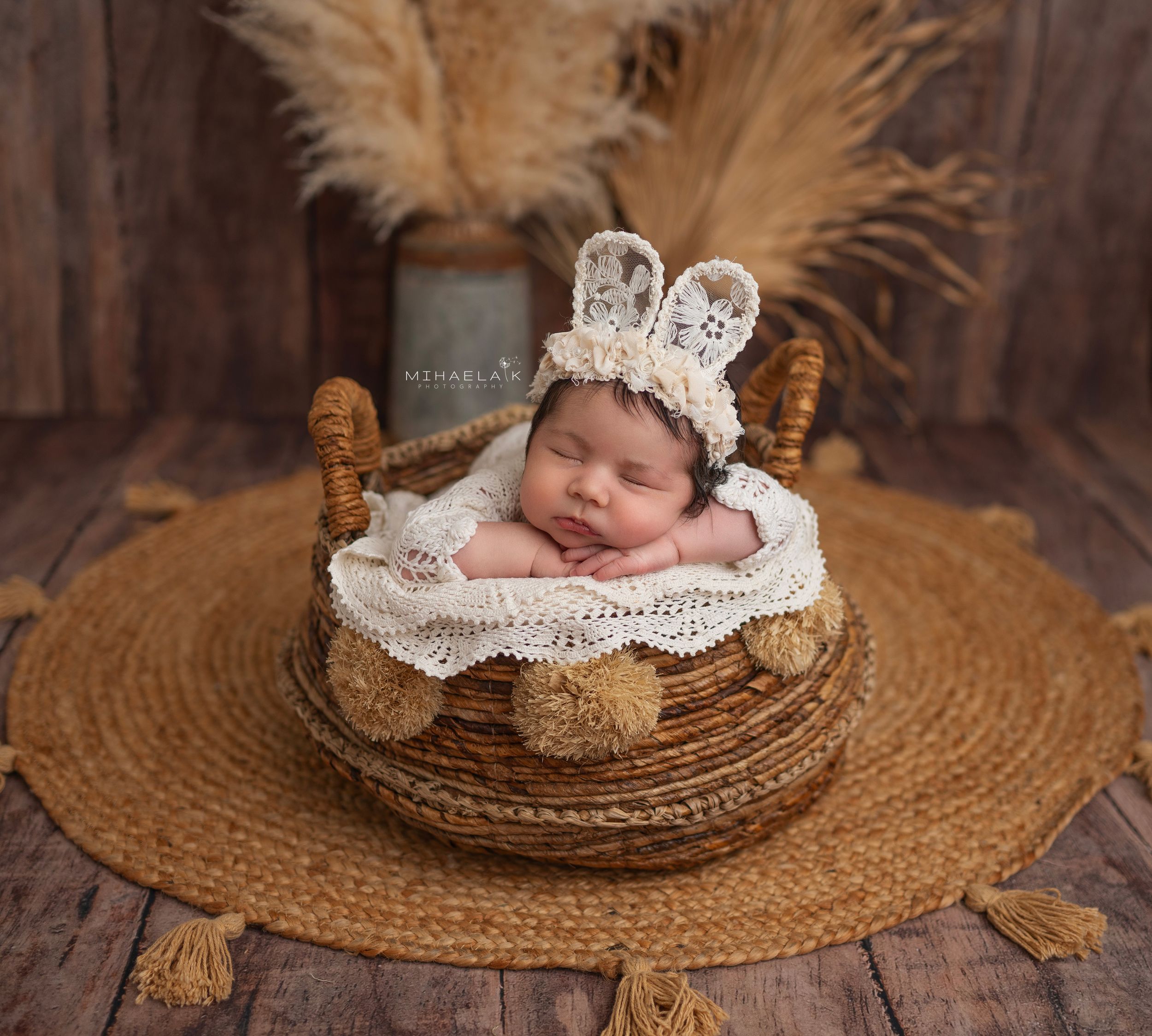 Newborn baby in white knit romper and  bunny headband , Brooklyn NYC baby photography.