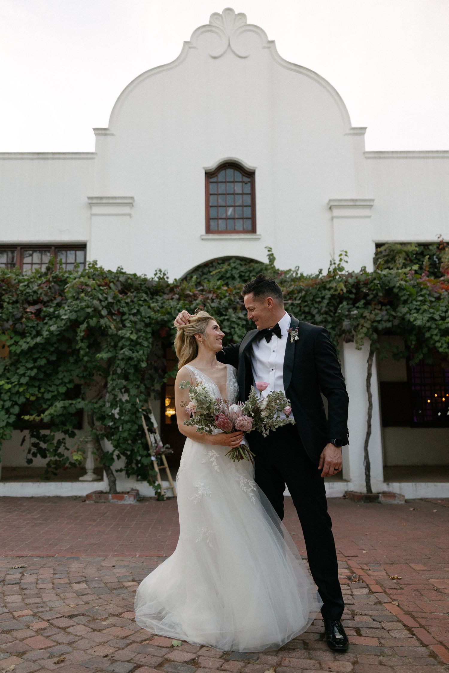 Aishling and Hendrik at Nooitgedacht Estate in Stellenbosch, documentary wedding photos capturing celebrations and beautiful portraits.