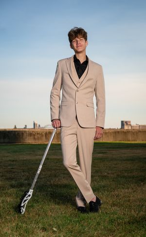 Senior Grad Pictures, Duluth Minnesota lacrosse player in suite