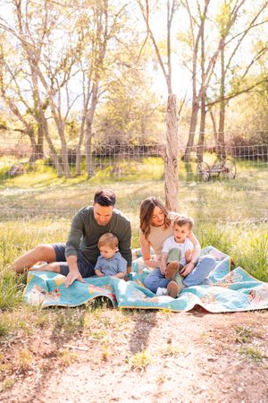 salt lake city utah family photographer, candid photo of a family on a blanket