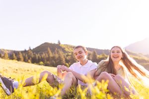 salt lake city utah family photographer, candid photo of teenage siblings rough housing
