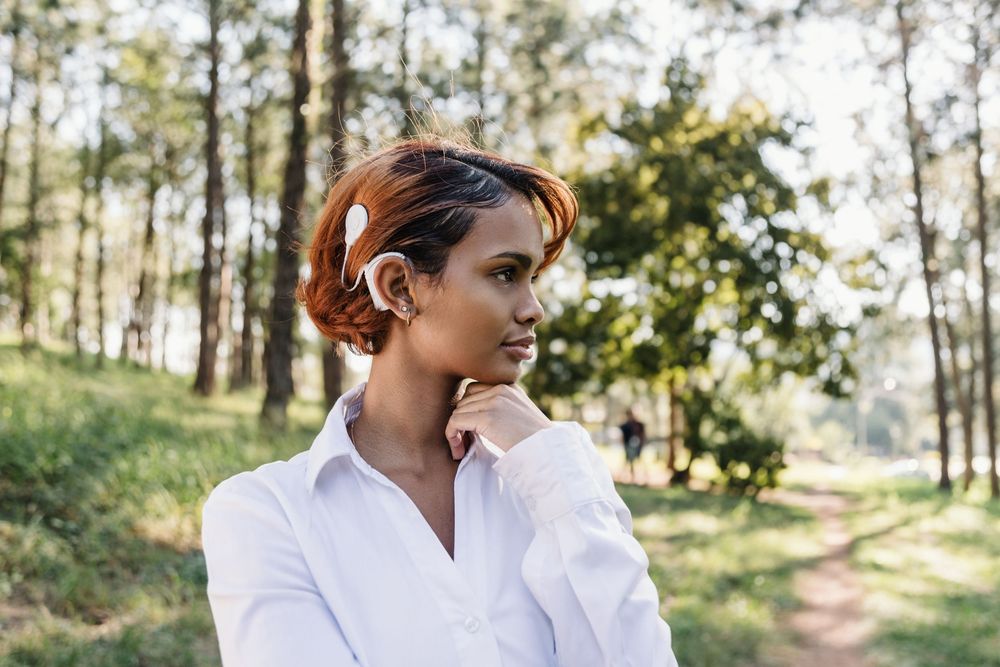 Woman with cochlear implant