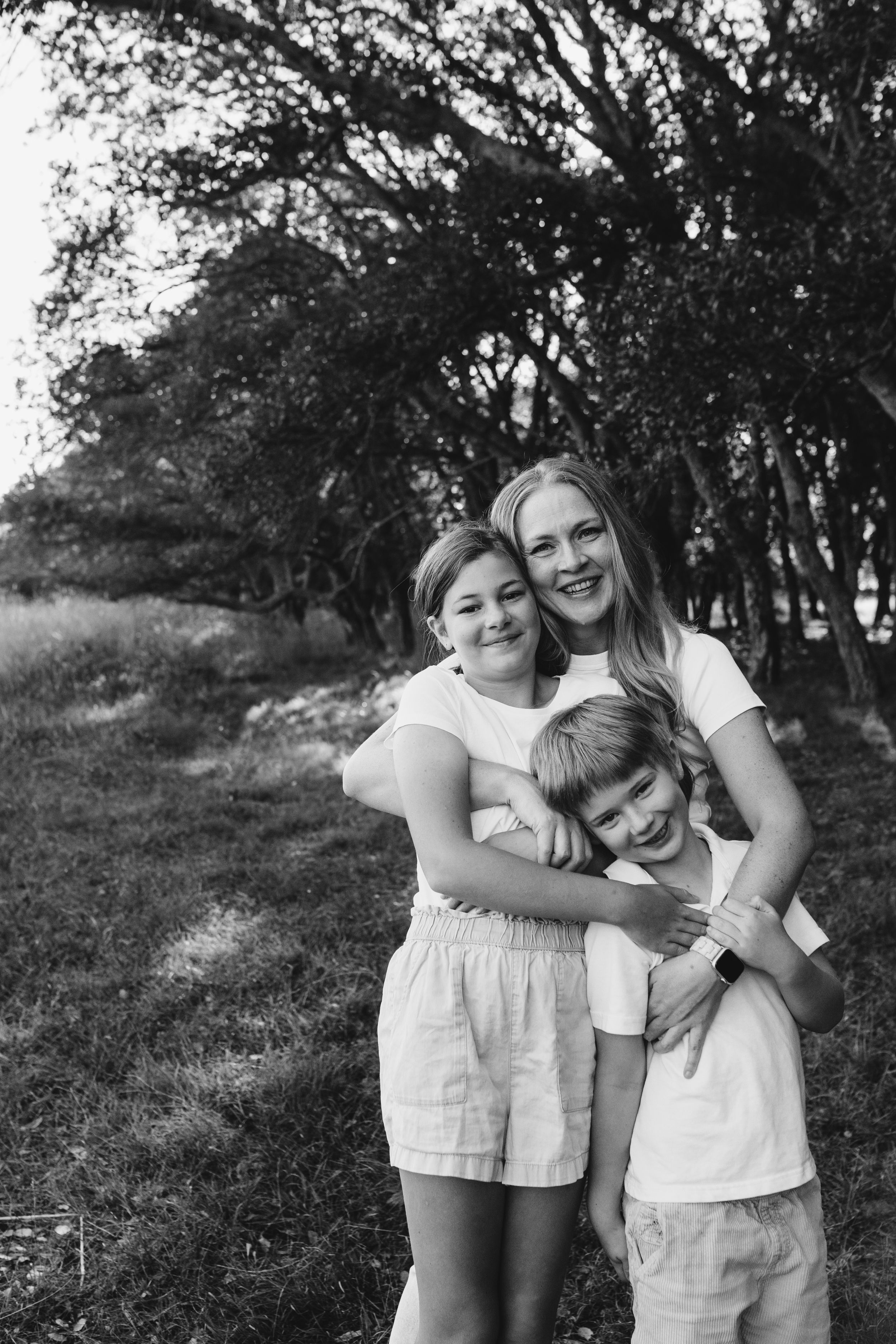 Canberra family photographer. Photo of mother and children, earth tone edit.  national arboretum