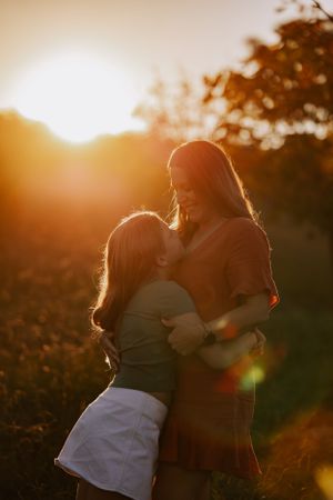 Canberra family photographer. Photo of mother and child, earth tone edit.  national arboretum