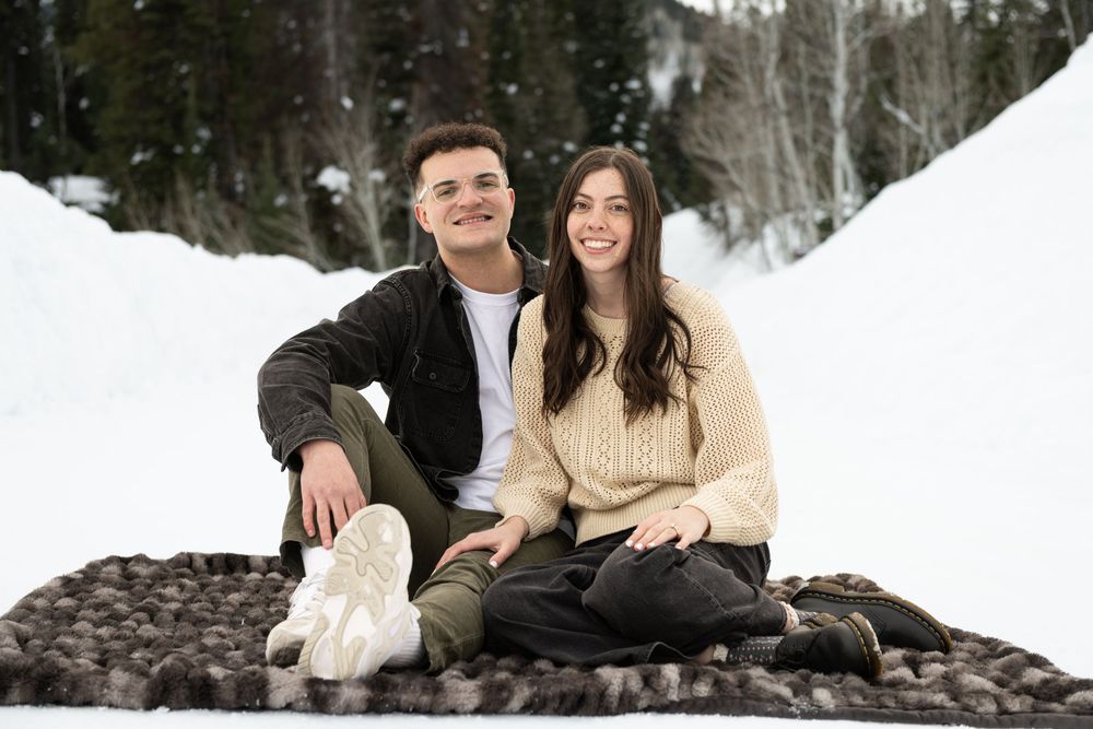 Engagement photo in the snowy mountains of Jordan Pines in Salt Lake