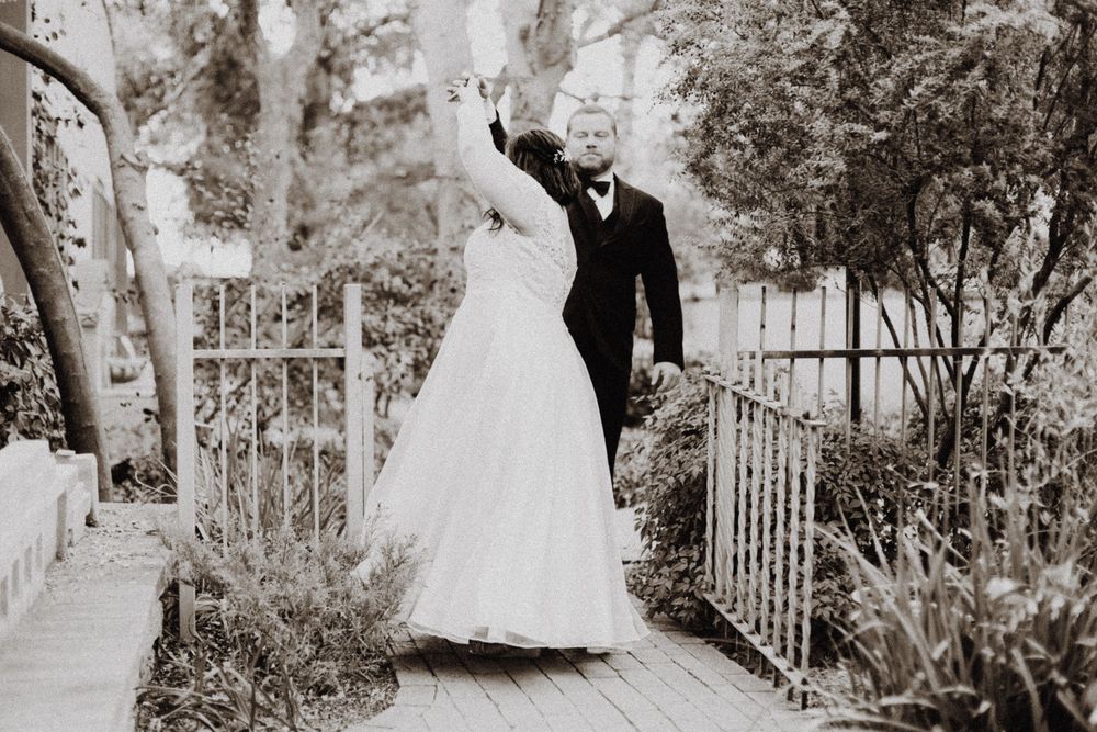 A series of black and white wedding photos showing couples posing in gardens and outdoor settings.