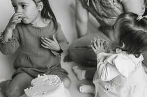 A black and white photo collage showing multiple candid moments of people eating and drinking together.