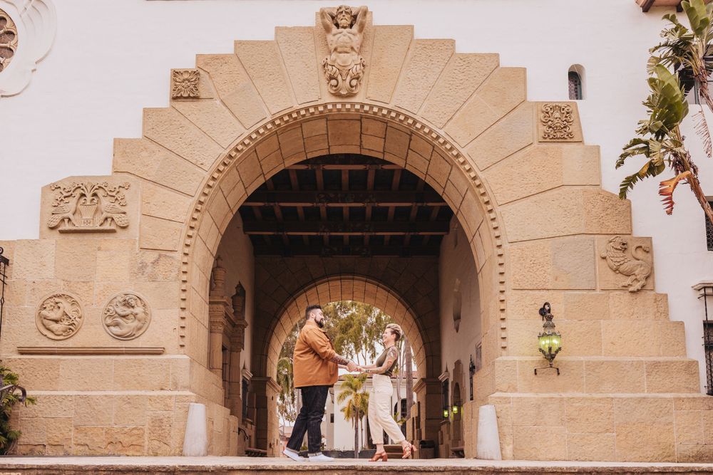 Architectural detail of Spanish colonial mission building with arched entryway.