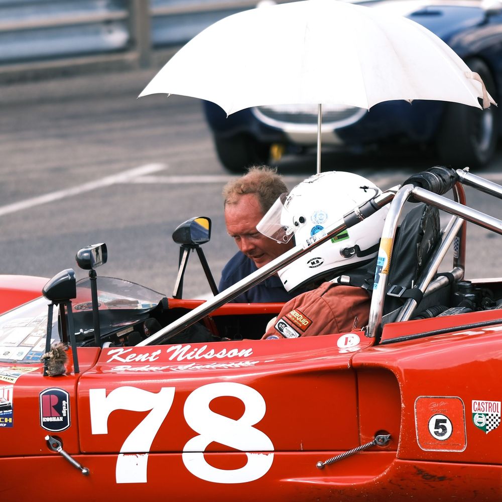 vintage race car on track grid at Pitt Race for PVGP Historics, 2025.