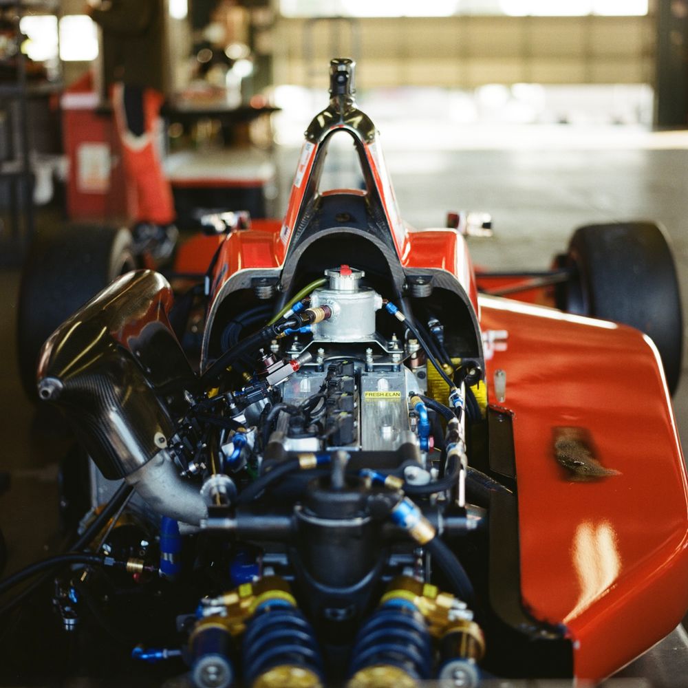 Red race car as shot in Watkins Glen's Vintage Grand Prix.