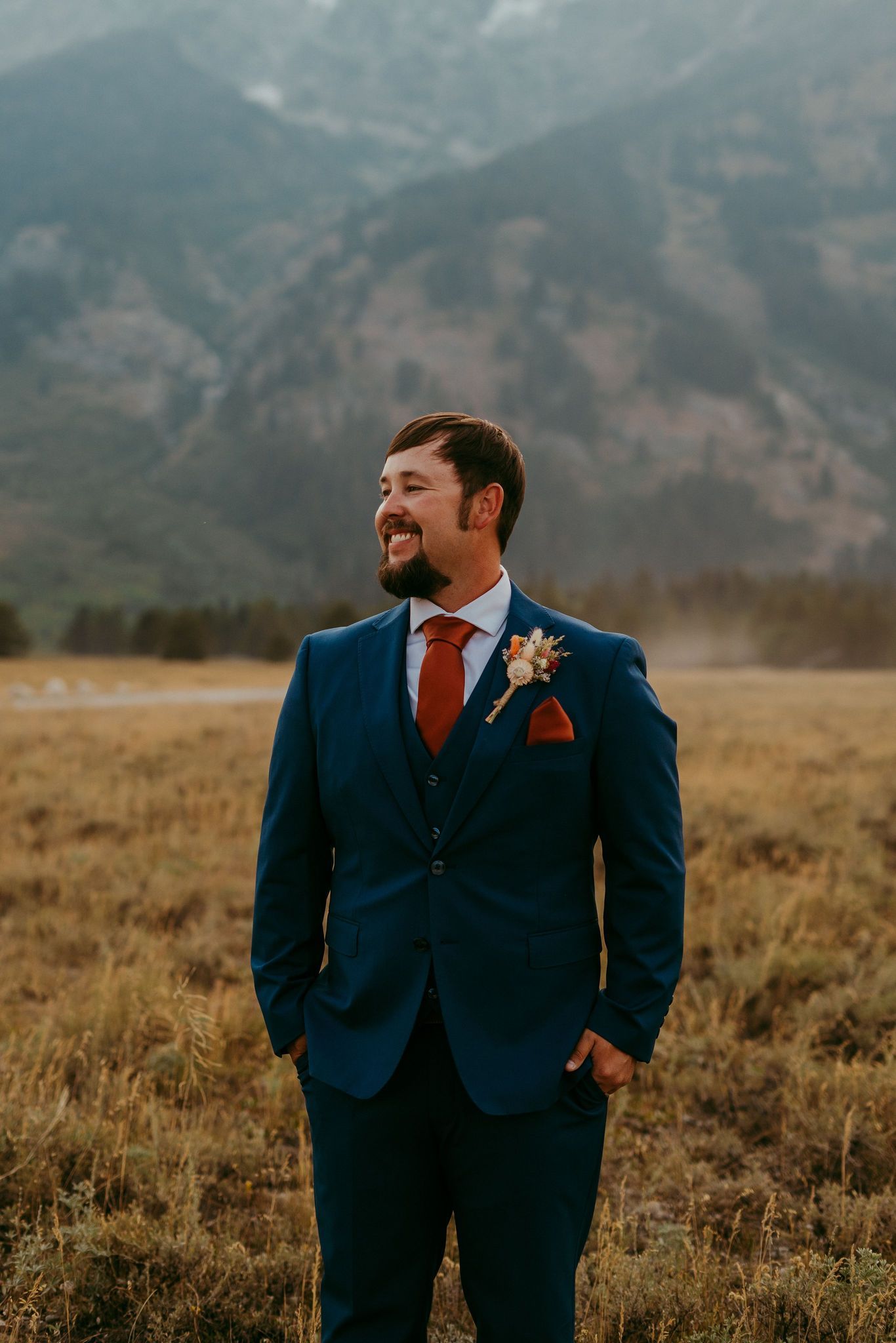 Outdoor wedding ceremony in Wyoming with mountain views and rustic charm