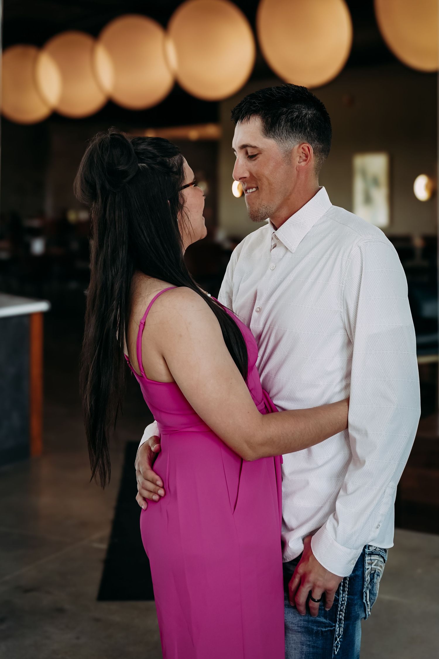 Man and woman engagement hugging St. James Mo.