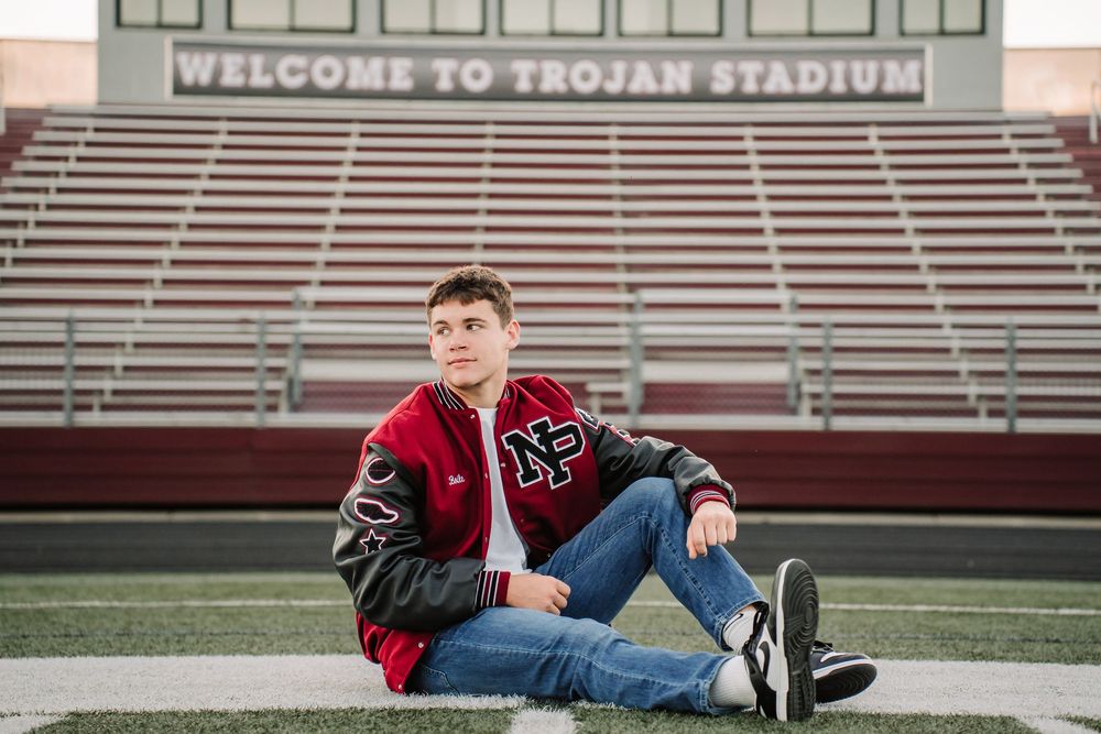 A collage of senior portrait photos taken at a sports stadium with bleachers and field visible in the background.