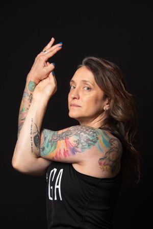 Yoga pose Portrait of woman with tattoos