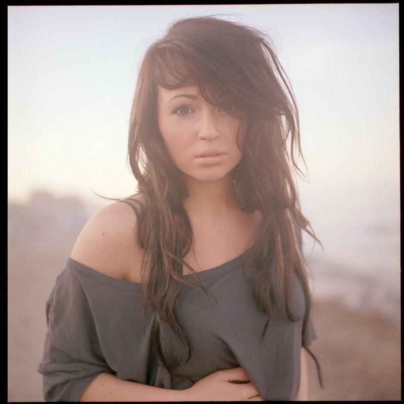 Soft portrait shot against misty background.