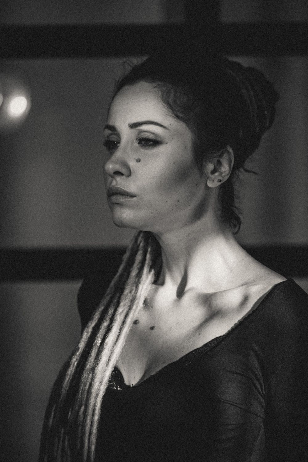 Film noir style portrait sequence showing dramatic angles and lighting.