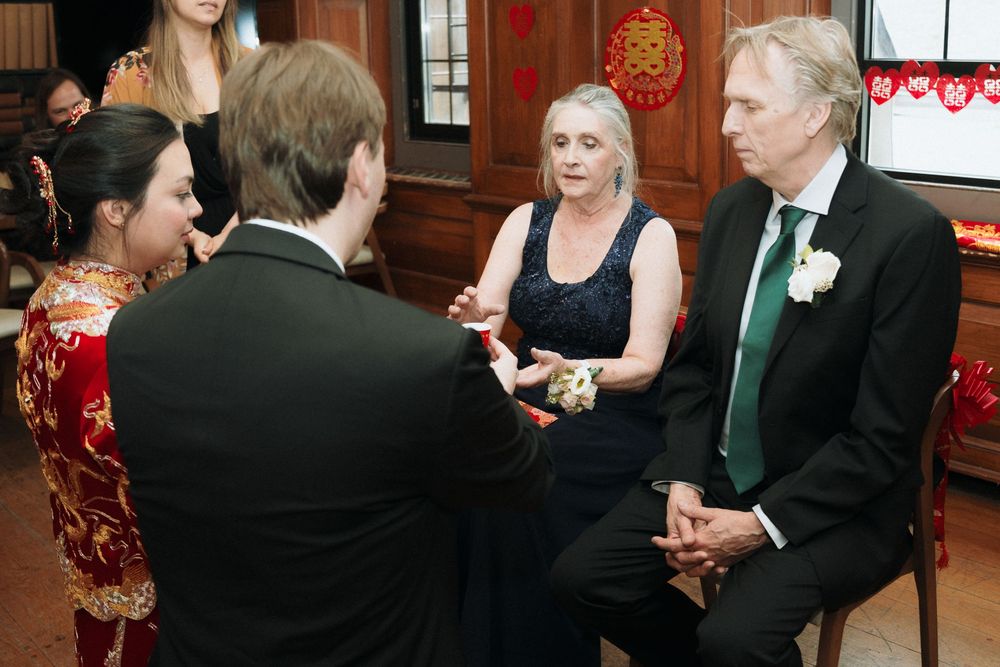 Cultural tea ceremony in traditional attire during Tiffany and Sam’s Toronto wedding.