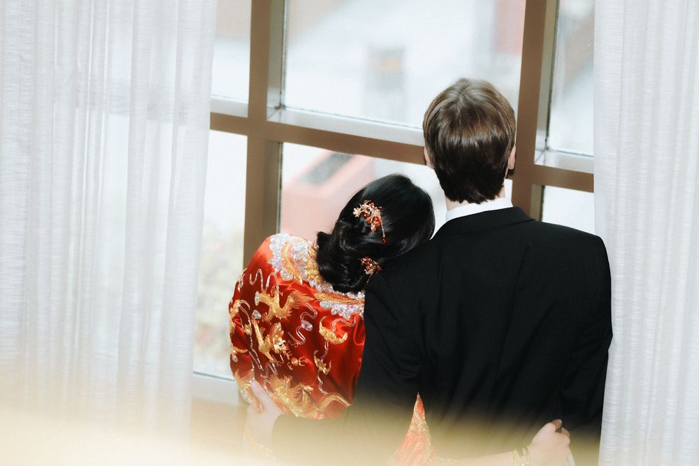 Cultural tea ceremony in traditional attire during Tiffany and Sam’s Toronto wedding.